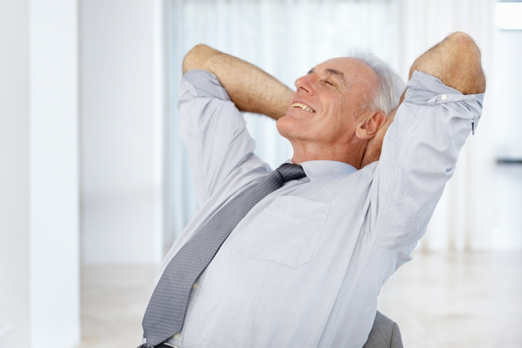 A business owner leaning back and relaxed.