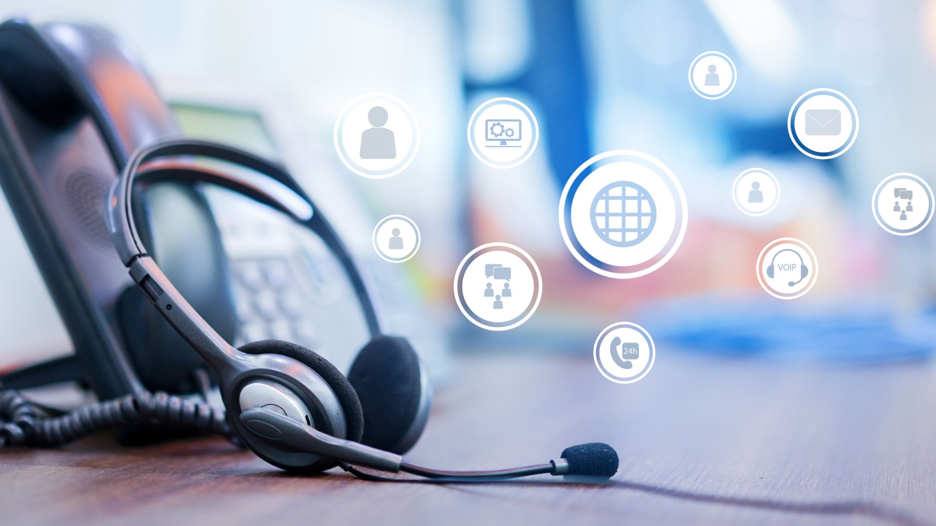 A voip phone with icons for cloud email and collaboration.