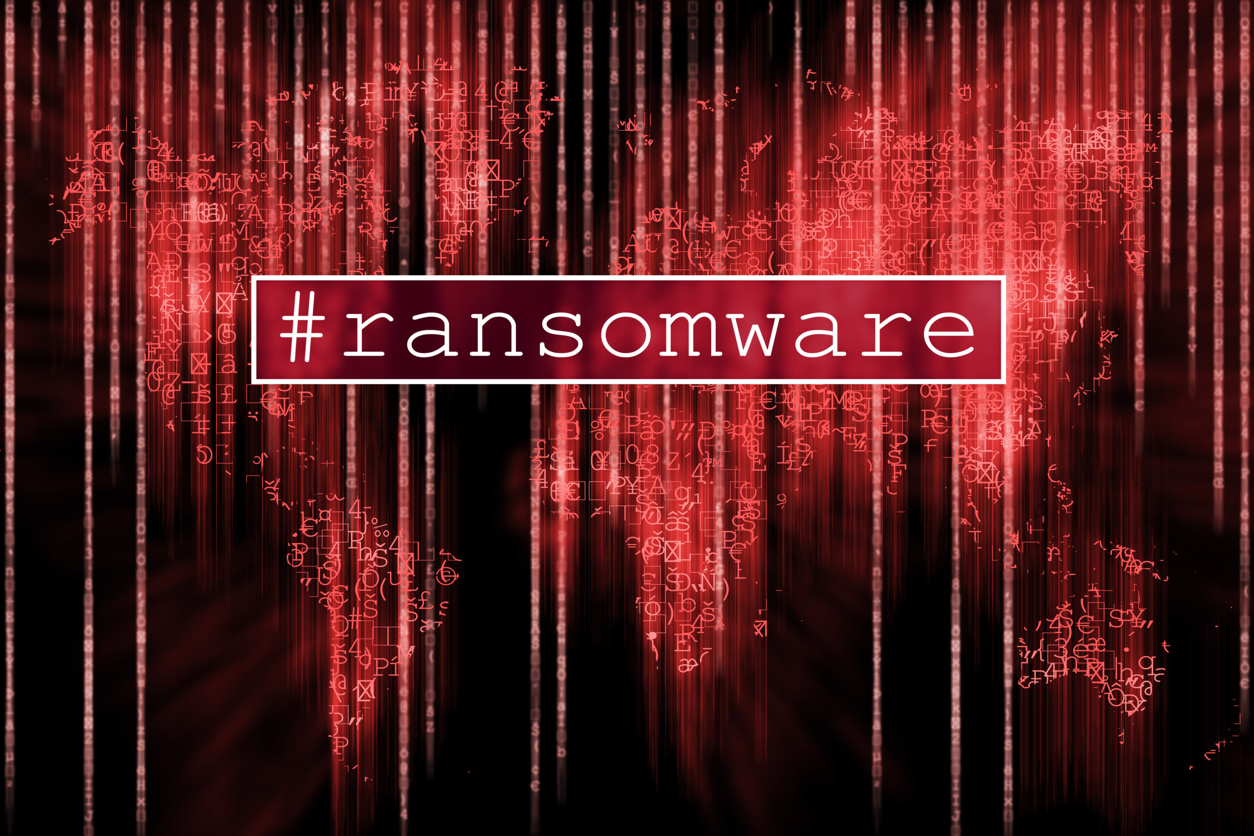A red digital background of the world with the word ransomware in the middle.